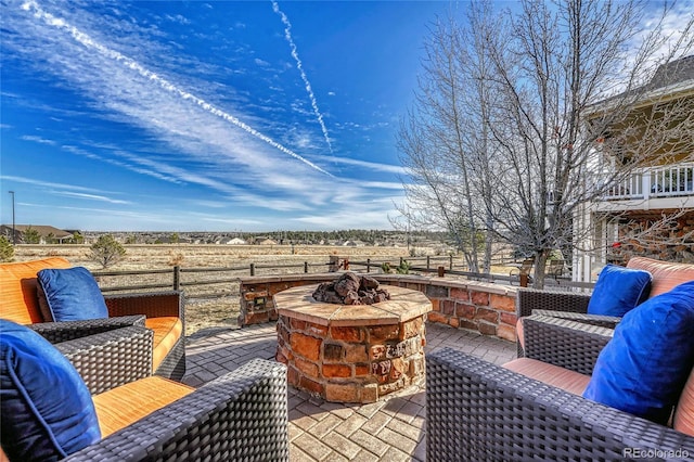 view of patio with a fire pit