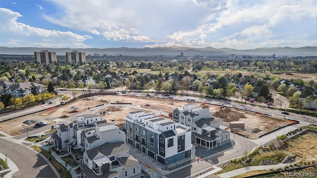 drone / aerial view featuring a mountain view