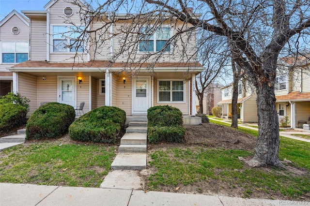 multi unit property featuring a porch