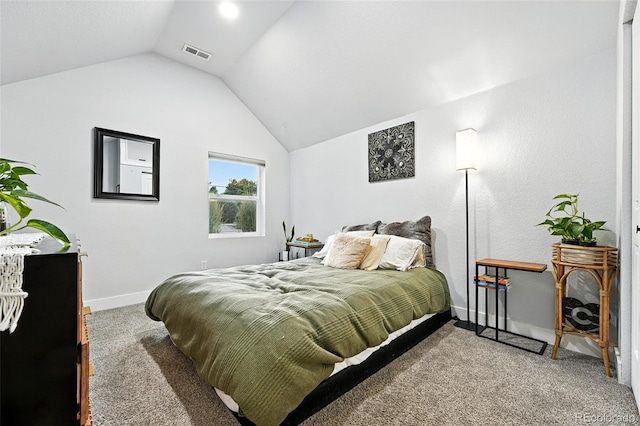 2500 Estes St, Lakewood, CO 80215 - carpeted bedroom featuring lofted ceiling and baseboards