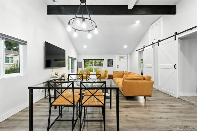 2500 Estes St, Lakewood, CO 80215 - dining area with a barn door, plenty of natural light, beamed ceiling, light wood-type flooring, and recessed lighting