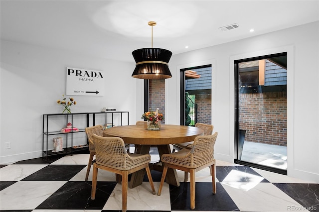 dining space featuring baseboards, visible vents, and recessed lighting