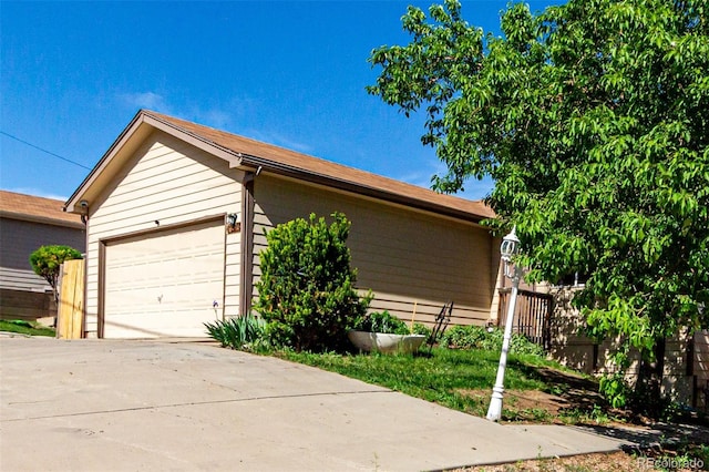 3296 S Bryant St, Englewood, CO 80110 - view of property exterior featuring fence and a garage