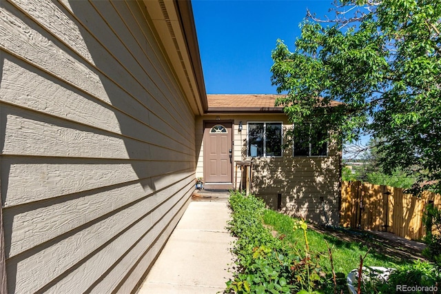 3296 S Bryant St, Englewood, CO 80110 - view of exterior entry with fence