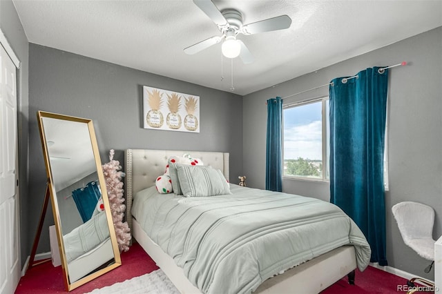 3296 S Bryant St, Englewood, CO 80110 - carpeted bedroom with a ceiling fan, baseboards, and a textured ceiling