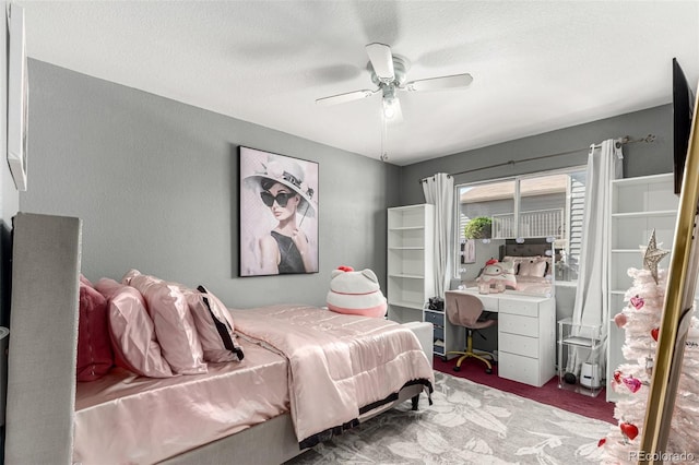 3296 S Bryant St, Englewood, CO 80110 - carpeted bedroom with a textured ceiling and a ceiling fan
