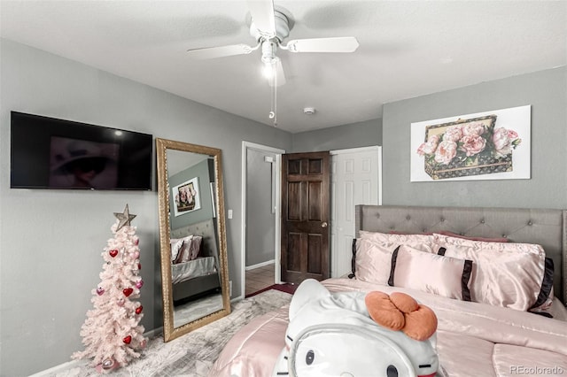 3296 S Bryant St, Englewood, CO 80110 - bedroom with baseboards, a closet, and a ceiling fan
