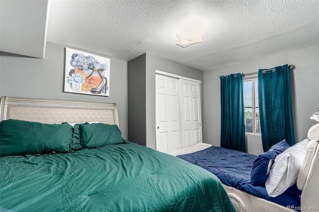 3296 S Bryant St, Englewood, CO 80110 - bedroom with a textured ceiling and a closet