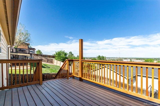 3296 S Bryant St, Englewood, CO 80110 - wooden terrace featuring a fenced backyard