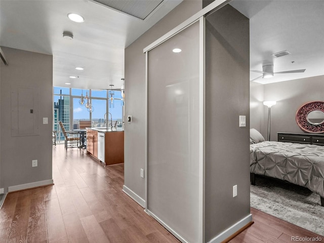 891 14th St Unit 3410, Denver, CO 80202 - corridor with wood finished floors, recessed lighting, and expansive windows