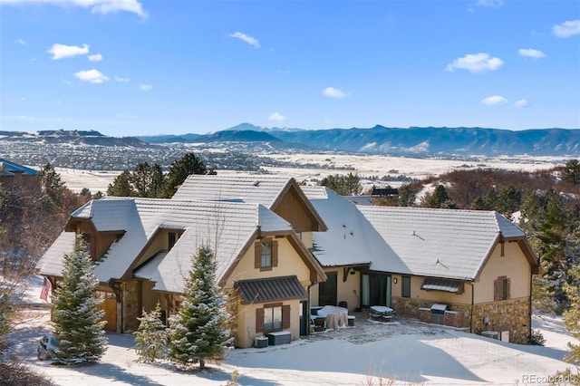 exterior space featuring a mountain view