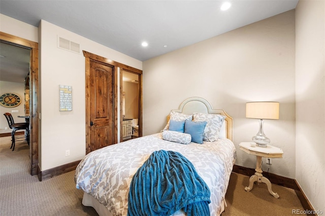 carpeted bedroom featuring a closet