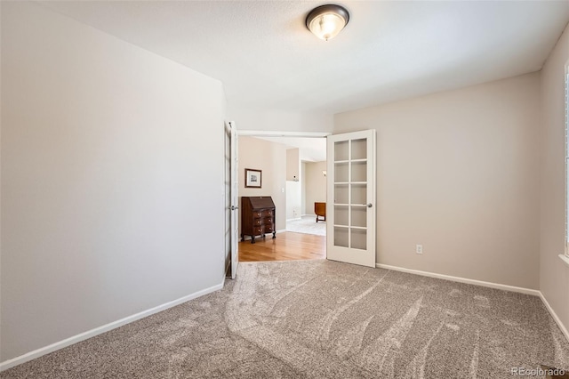 23808 E Bellewood Dr, Aurora, CO 80016 - spare room featuring carpet and french doors