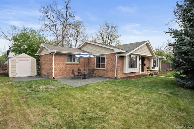 1100 Pontiac St, Denver, CO 80220 - rear view of house with brick siding, a storage shed, a patio area, an outdoor structure, and a shingled roof