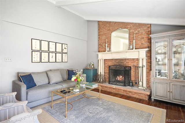 1100 Pontiac St, Denver, CO 80220 - living room featuring wood finished floors, a brick fireplace, and crown molding