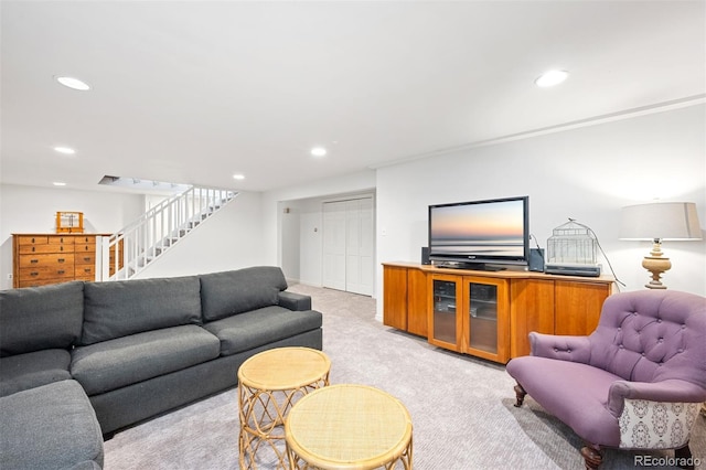 1100 Pontiac St, Denver, CO 80220 - living area with light colored carpet, recessed lighting, and stairway