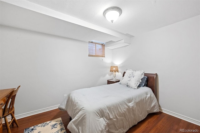 1100 Pontiac St, Denver, CO 80220 - bedroom with wood finished floors and baseboards