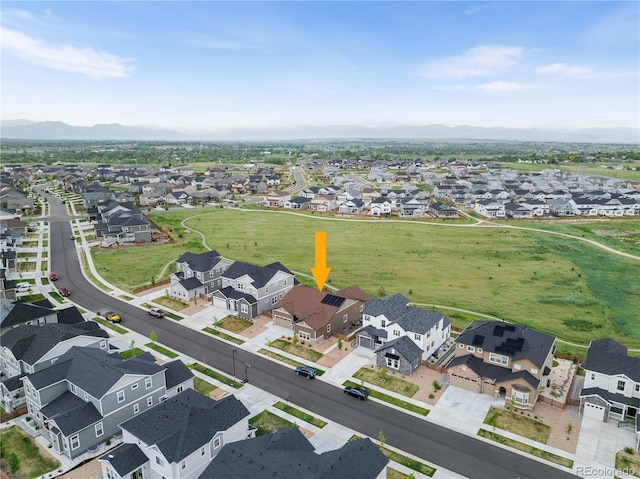 aerial view featuring a mountain view and a residential view