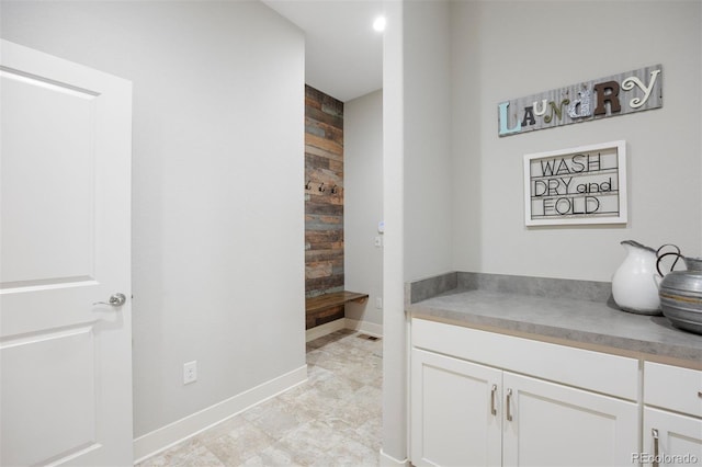 bathroom with baseboards