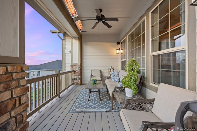 balcony featuring a ceiling fan and an outdoor hangout area