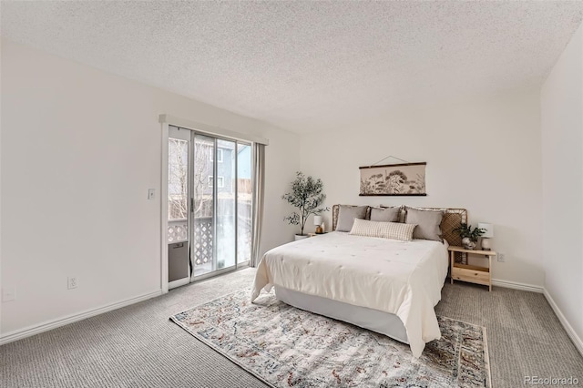 bedroom with a textured ceiling, access to outside, carpet, and baseboards