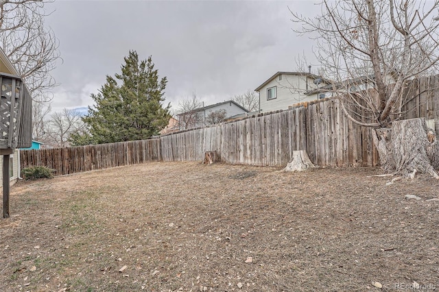 view of yard featuring a fenced backyard