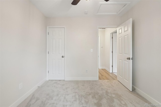 6337 W 68th Pl, Arvada, CO 80003 - unfurnished bedroom featuring carpet floors, attic access, baseboards, and a ceiling fan