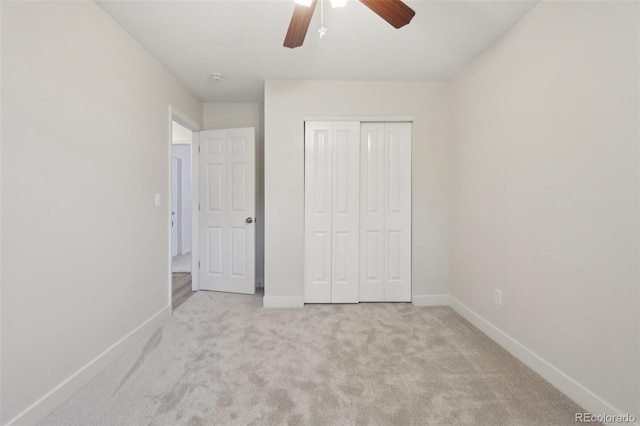6337 W 68th Pl, Arvada, CO 80003 - unfurnished bedroom with carpet, baseboards, a closet, and ceiling fan