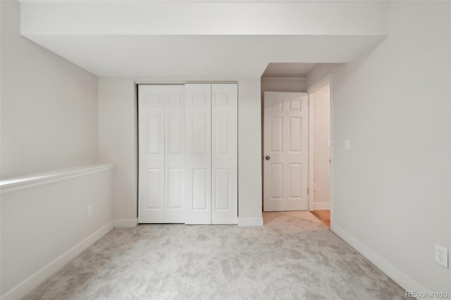 6337 W 68th Pl, Arvada, CO 80003 - unfurnished bedroom with carpet floors, a closet, and baseboards