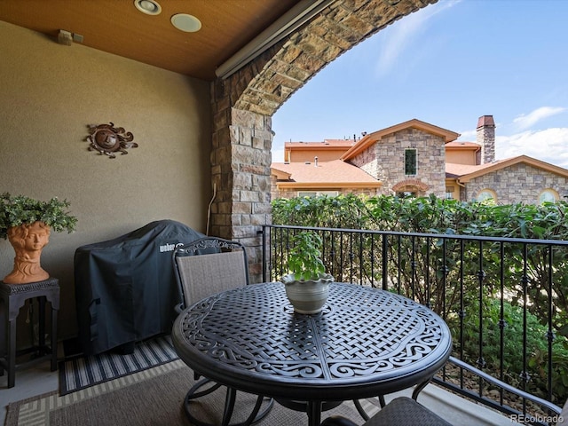 2363 Primo Rd Unit A, Highlands Ranch, CO 80129 - balcony with outdoor dining area and a grill