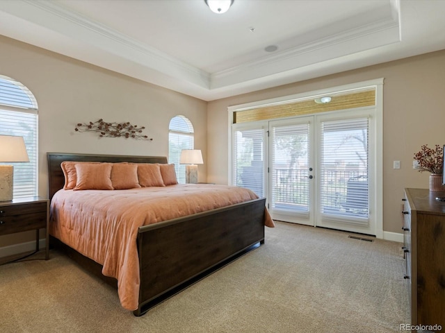 2363 Primo Rd Unit A, Highlands Ranch, CO 80129 - bedroom featuring access to outside, crown molding, light carpet, french doors, and a raised ceiling
