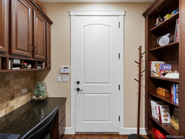 2363 Primo Rd Unit A, Highlands Ranch, CO 80129 - entryway featuring baseboards and dark wood-type flooring