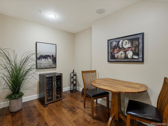 2363 Primo Rd Unit A, Highlands Ranch, CO 80129 - dining room featuring wine cooler and wood finished floors
