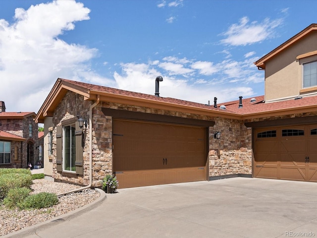 2363 Primo Rd Unit A, Highlands Ranch, CO 80129 - single story home with stone siding and a garage