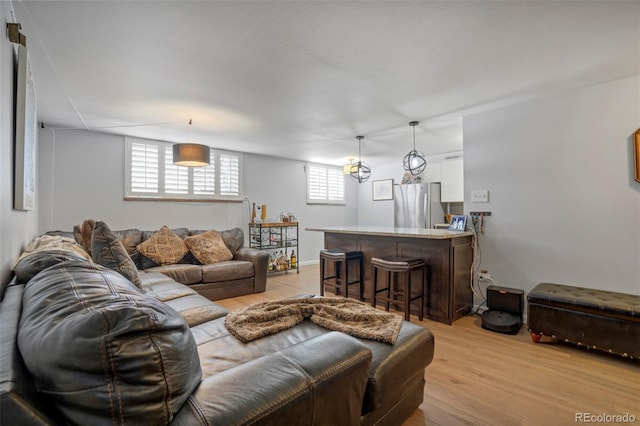 living room featuring light wood-style flooring
