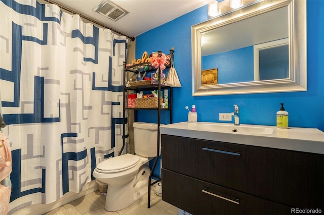full bathroom featuring visible vents, tile patterned flooring, vanity, toilet, and a shower with curtain