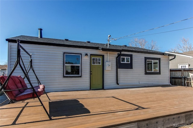 rear view of house with a deck