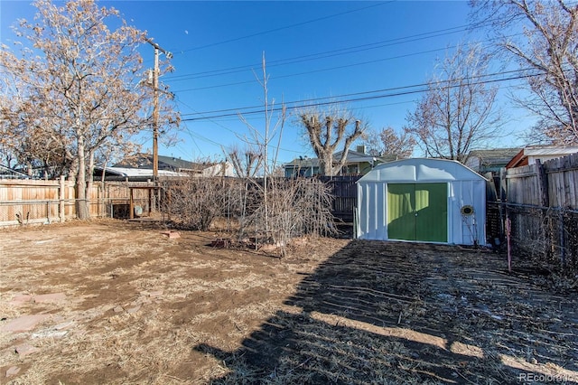 view of yard with a storage shed