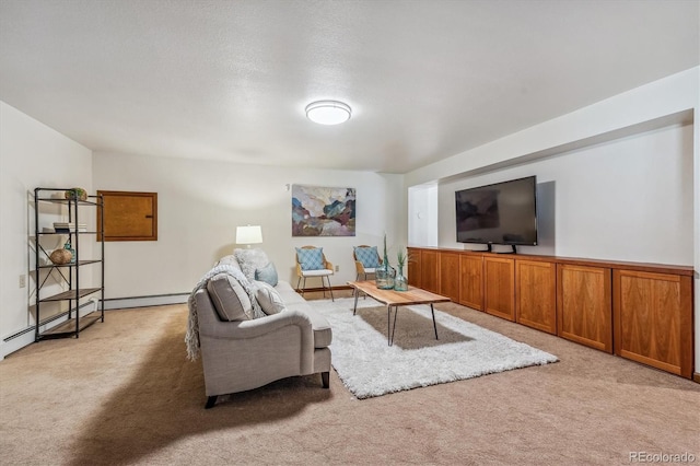 living room featuring baseboard heating and light carpet