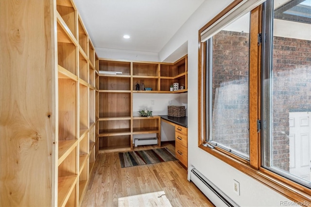 pantry featuring baseboard heating