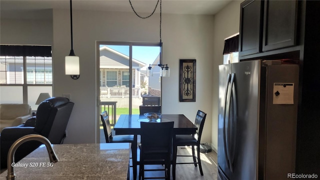 dining area with light hardwood / wood-style floors