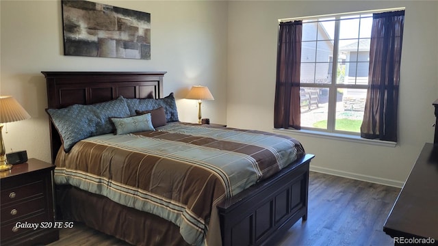 bedroom featuring wood-type flooring