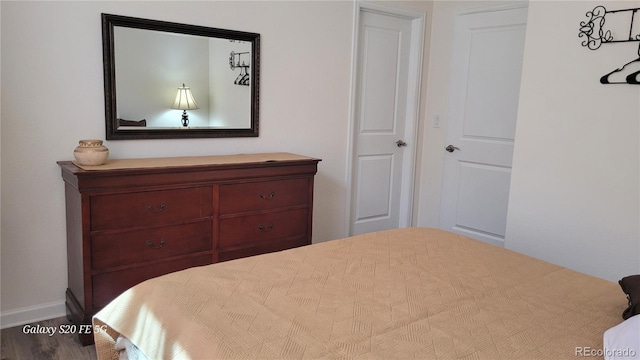 bedroom featuring hardwood / wood-style floors