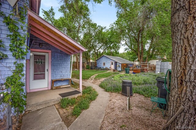 2402 W Uintah St, Colorado Springs, CO 80904 - view of yard featuring an outdoor structure