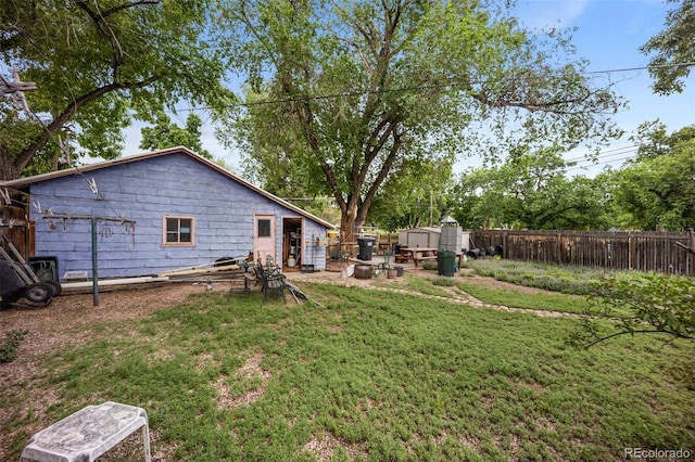 2402 W Uintah St, Colorado Springs, CO 80904 - fenced backyard featuring a storage shed