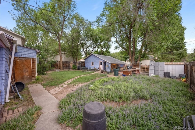 2402 W Uintah St, Colorado Springs, CO 80904 - fenced backyard featuring an outdoor structure