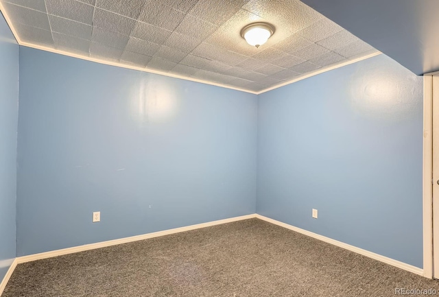 carpeted spare room with ornamental molding