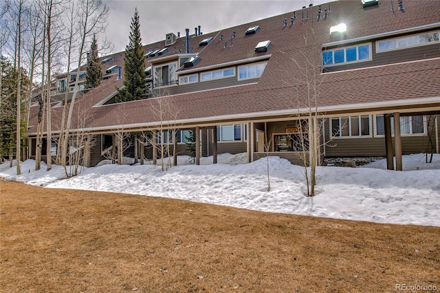 21650 US Highway 6 Unit 2096, Dillon, CO 80435 - snow covered back of property with a yard