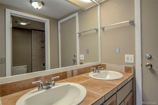 21650 US Highway 6 Unit 2096, Dillon, CO 80435 - full bathroom with double vanity and toilet