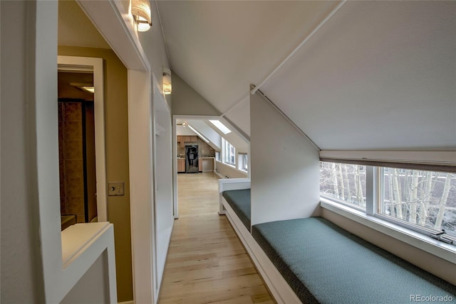 21650 US Highway 6 Unit 2096, Dillon, CO 80435 - corridor featuring light wood-type flooring and vaulted ceiling